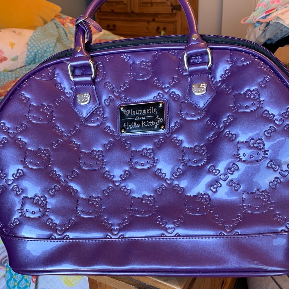 Loungefly loves hello Kitty slightly worn purse. See pictures